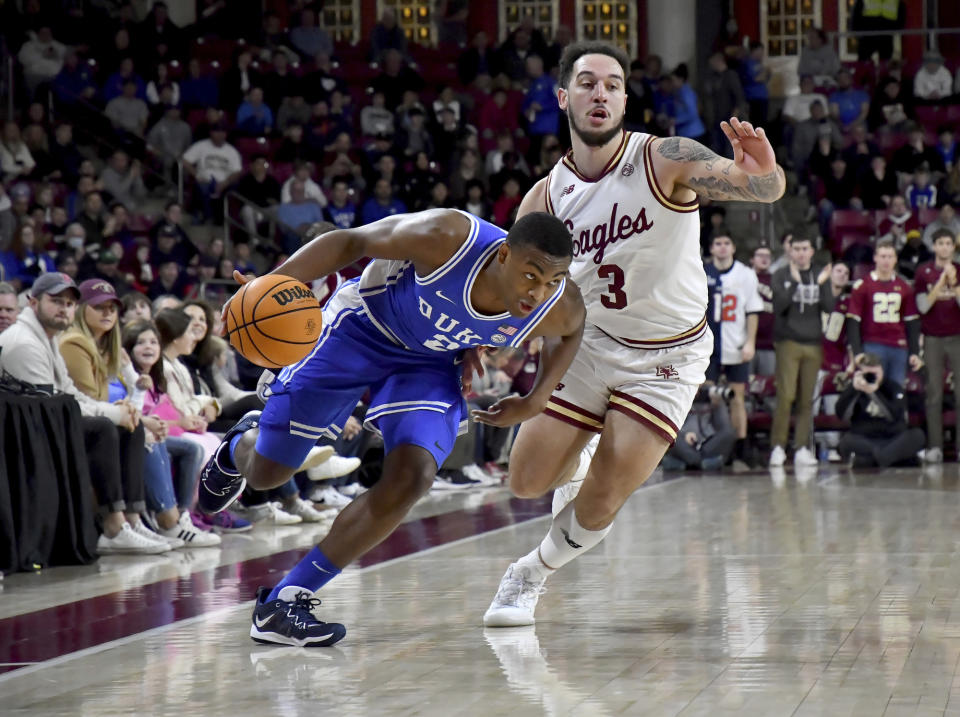 Duke's Jaylen Blakes (2) drives past Boston College's Jaeden Zackery (3) on the way to the basket during the first half of an NCAA college basketball game, Saturday, Jan. 7, 2023, in Boston. (AP Photo/Mark Stockwell)
