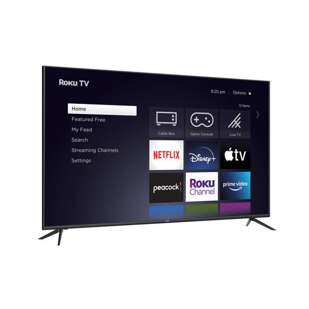 Angled TV showing ROKU TV home screen.