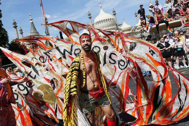 BRIGHTON, ENGLAND - AUGUST 06: Festival goers participate in the Pride LGBTQ+ Community Parade – ‘Love, Protest & Unity’ during the Brighton Pride on August 06, 2022 in Brighton, England. (Photo by Tristan Fewings/Getty Images) (Photo: Tristan Fewings via Getty Images)