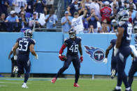 Tennessee Titans long snapper Morgan Cox (46) celebrates after intercepting a pass by the New York Giants during the first half of an NFL football game Sunday, Sept. 11, 2022, in Nashville. (AP Photo/Mark Humphrey)