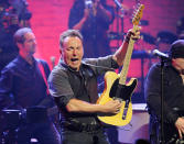 Bruce Springsteen and the E Street Band perform at the Apollo Theater on Friday, March 9, 2012 in New York. The concert was hosted by SiriusXM in celebration of 10 years of satellite radio. (AP Photo/Evan Agostini)