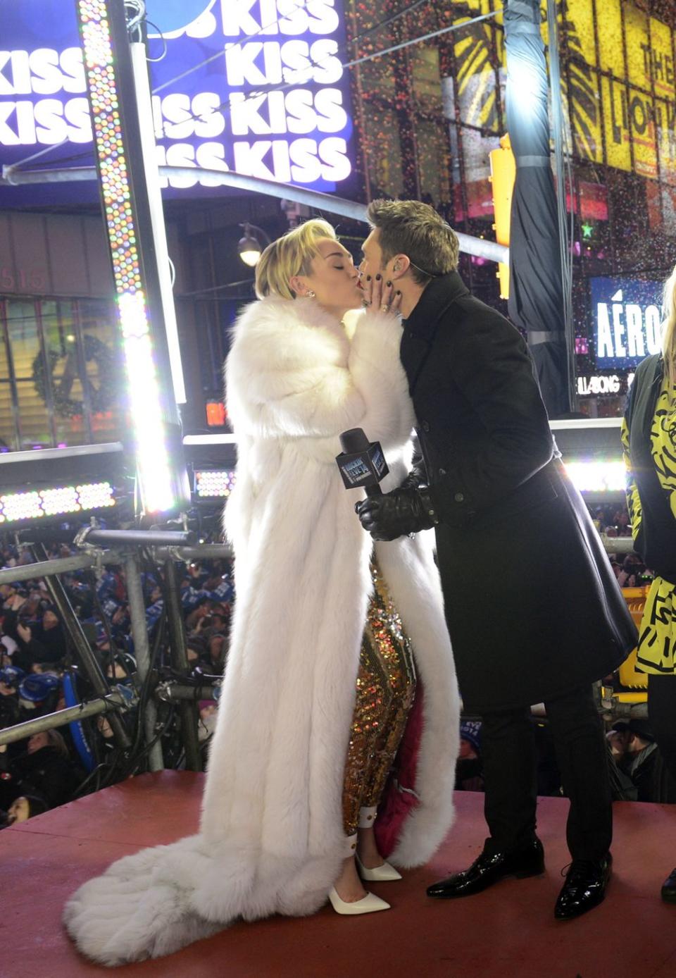 Miley Cyrus and Ryan Seacrest Lock Lips in 2013