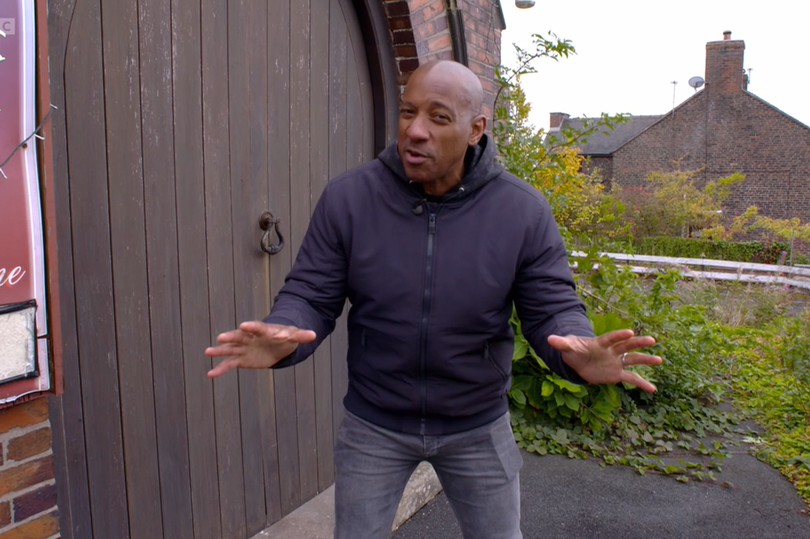 Dion Dublin outside of the property