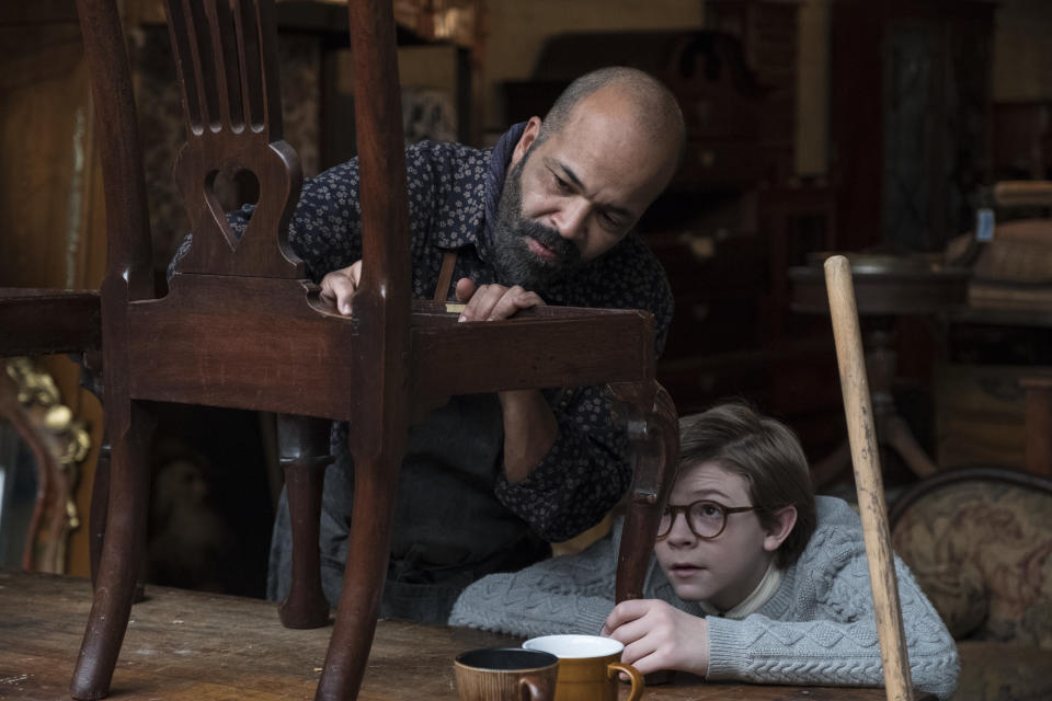 (L-r) JEFFREY WRIGHT as Hobie and OAKES FEGLEY as Young Theo in Warner Bros. Pictures and Amazon Studios drama, THE GOLDFINCH, a Warner Bros. Pictures release.