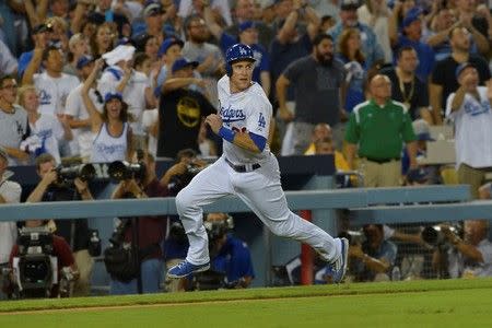 Oct 10, 2015; Los Angeles, CA, USA; Los Angeles Dodgers second baseman Chase Utley (26) scores on a two-RBI double by first baseman Adrian Gonzalez (not pictured) against the New York Mets during the seventh inning in game two of the NLDS at Dodger Stadium. Mandatory Credit: Jayne Kamin-Oncea-USA TODAY Sports