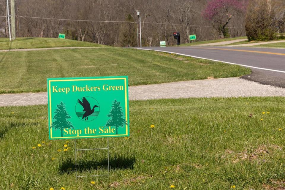 Neighbors place “Keep Duckers Green, Stop the Sale” signs in their yards, as seen in Frankfort, Kentucky, Friday, March 29, 2024. The land was bought by Franklin County in 2022 for $850,000. Now the county may sell it to developers for as much as $1.3 million.