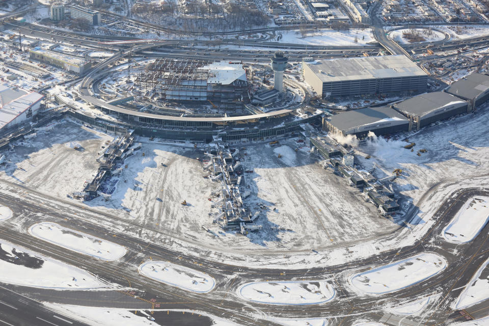 NEW YORK, NY - JANUARY 05:  La Guardia Airport awaits arriving flights after runways were plowed of snow on  January 5, 2018 in the Queens borough of New York City. Under frigid temperatures, New York City dug out from the 'Bomb Cyclone.'  (Photo by John Moore/Getty Images)