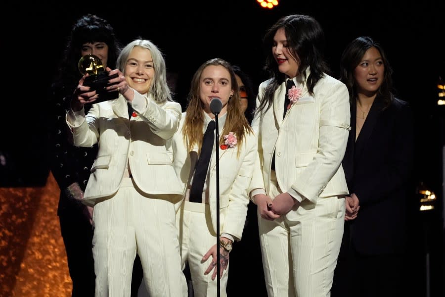 Phoebe Bridgers, from left, Julien Baker, and Lucy Dacus, of boygenius, accept the award for best alternative music album for “The Record” during the 66th annual Grammy Awards on Sunday, Feb. 4, 2024, in Los Angeles. (AP Photo/Chris Pizzello)