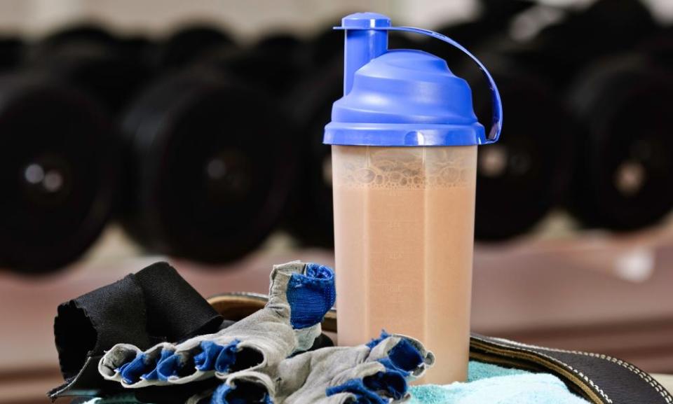 Fitness shake and gear in gym