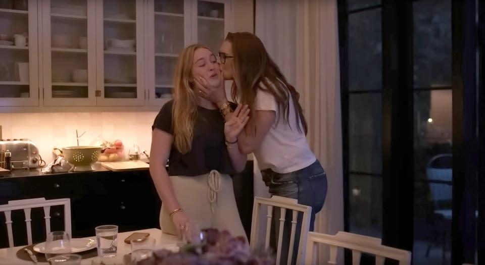 Rowan Francis Henchy and Brooke Shields embrace in their kitchen