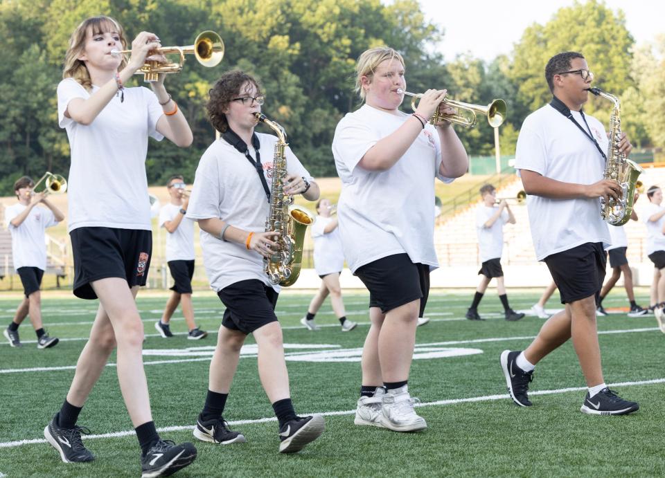 The Massillon Tiger Swing Band will perform a salute to composer Sammy Nestico today during its halftime performance at the Tigers' home opener. The band will debut a song composed by Nestico that will be used in an upcoming documentary about the composer.