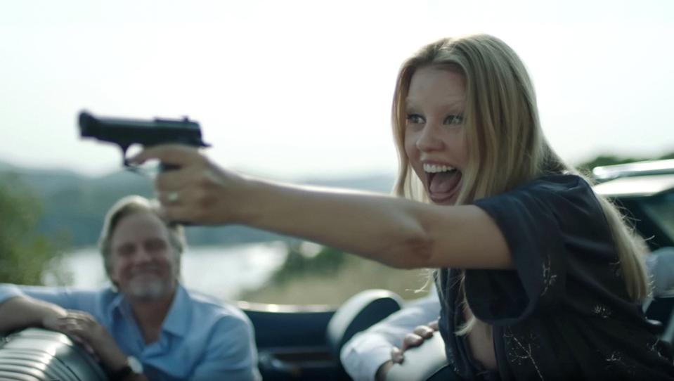 Mia Goth takes aim in Brandon Cronenberg&#39;s horror satire Infinity Pool (Photo: Neon/Courtesy Everett Collection)