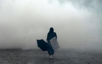 The Place d'Italie in Paris filled with tear gas as the clashes continued