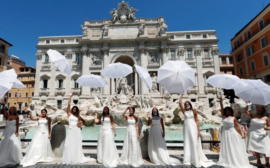 Brides-to-be make their point at one of Rome's landmarks - REUTERS/YARA NARDI