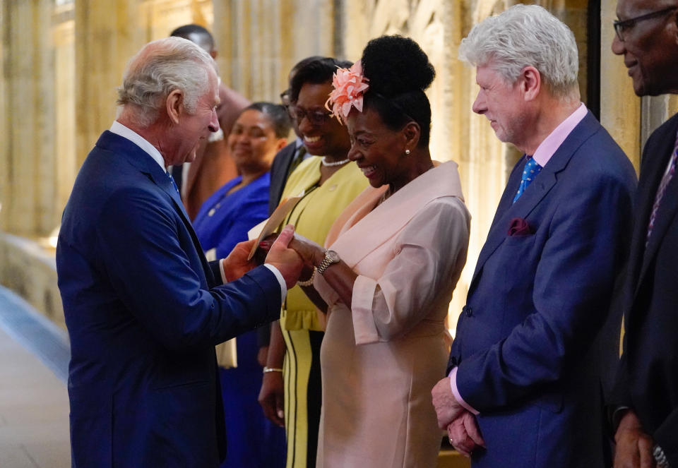 WINDSOR, ENGLAND - JUNE 22: King Charles III speaks with Baroness Dame Floella Benjamin, following a service at St George's Chapel, Windsor Castle for young people, to recognise and celebrate the Windrush 75th Anniversary, on June 22, 2023 in Windsor, England. (Photo by Andrew Matthews - WPA Pool/Getty Images)