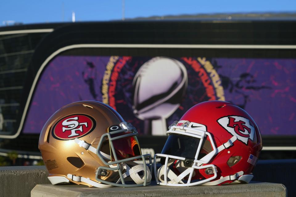 San Francisco 49ers and Kansas Chiefs helmets sit outside of Allegiant Stadium in Las Vegas on Jan. 30, 2024.