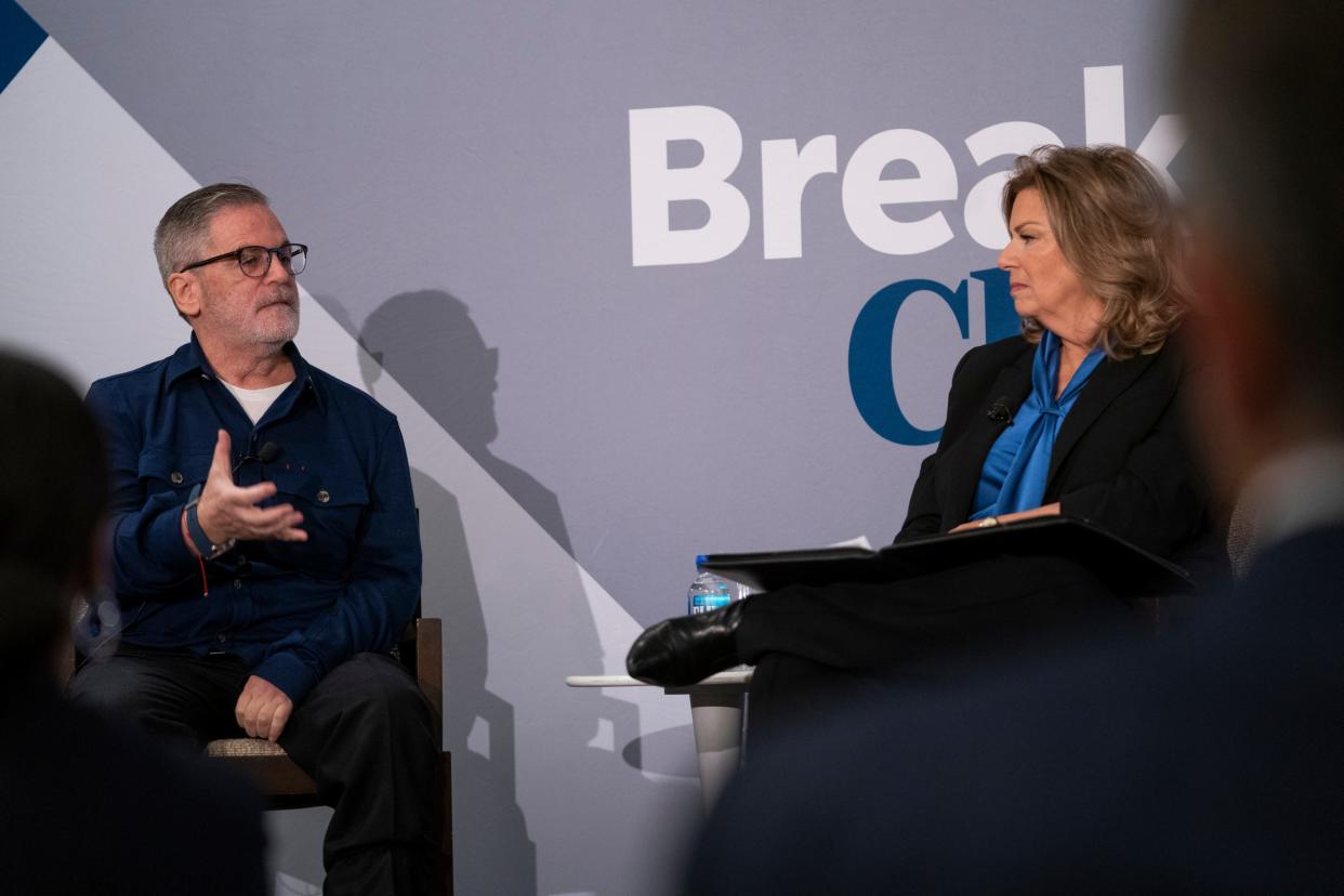 Dan Gilbert, president and chairman of Rocket Companies and philanthropist, left, answers questions by Carol Cain as The Detroit Free Press Breakfast Club hosted Gilbert at the Townsend Hotel in Birmingham on Thursday, Nov. 30, 2023.