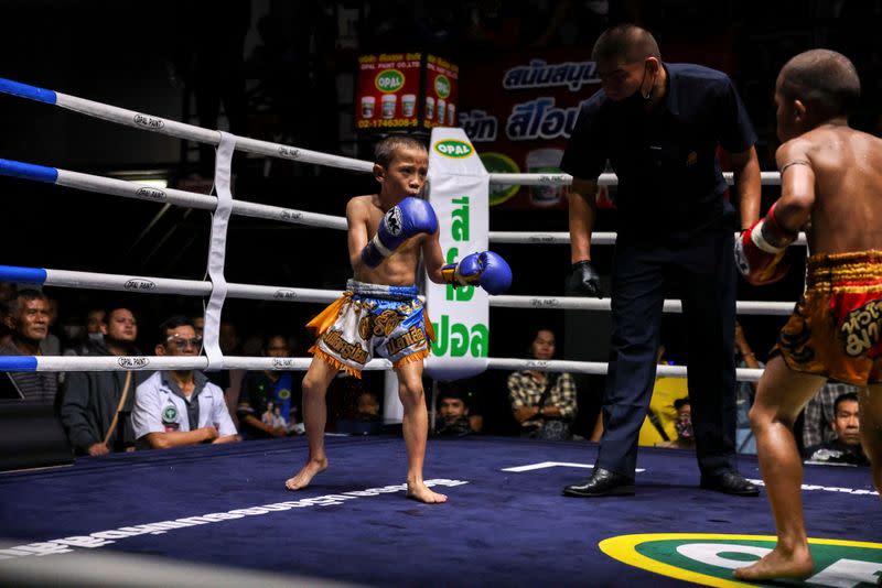 The Wider Image: Punching out of poverty: Despite risks, nine-year-old Thai fighter eager to return to ring