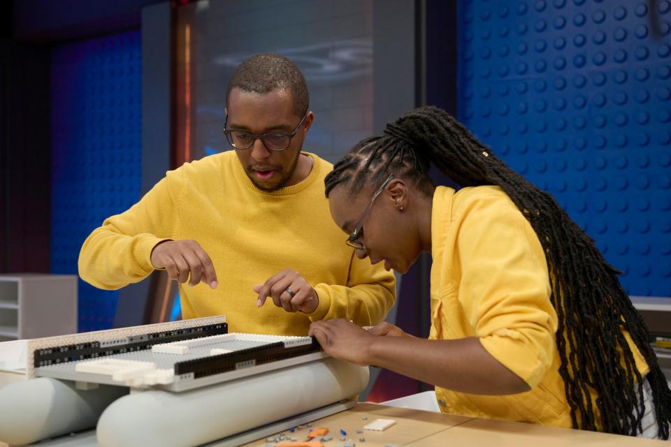 Siblings Paul Wellington and Nealita Nelson brick building on "Lego Masters" Season 4.