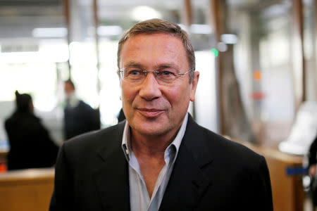 Nochi Dankner, the chairman of indebted Israeli conglomerate IDB Holding Corp, arrives ahead of a court hearing at the district court in Tel Aviv, Israel December 17, 2013. REUTERS/Amir Cohen/File Photo