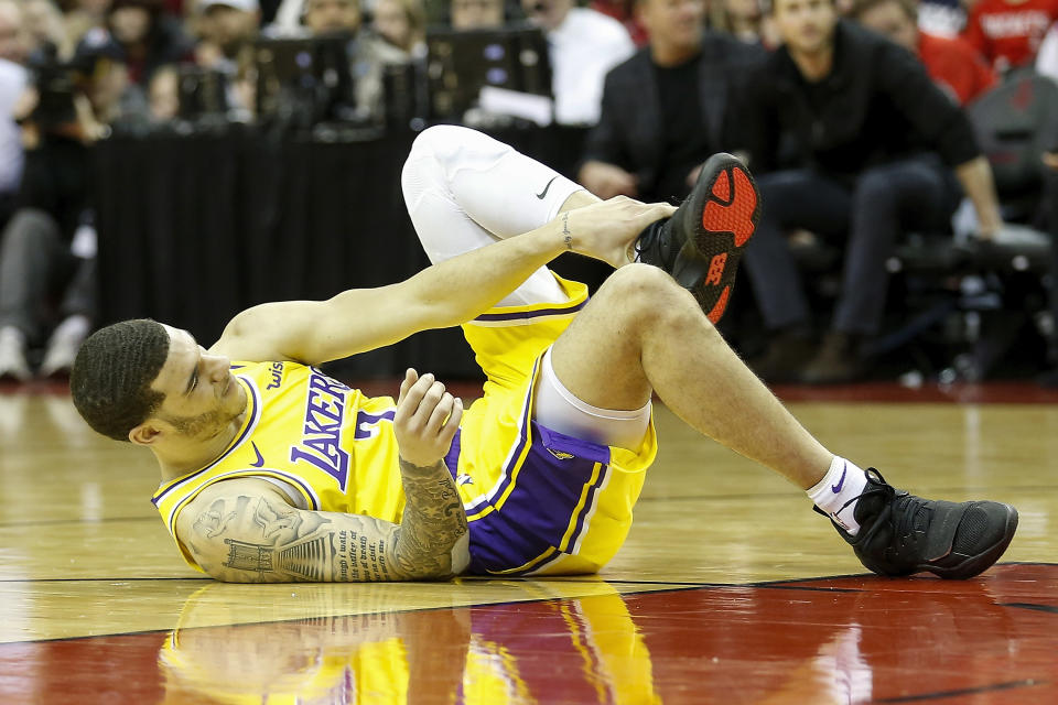 Just as they were about to get LeBron James back, the Lakers will miss Lonzo Ball for at least a month. (Photo by Tim Warner/Getty Images)