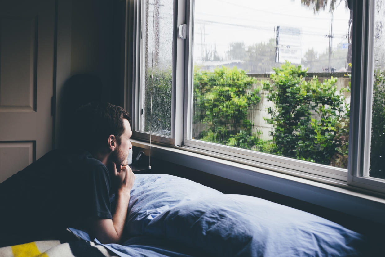 Waking to bad weather could leave us feeling sluggish for the rest of the day. (Posed by a model, Getty Images)