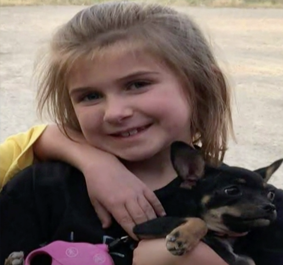 Eight-year-old Jaylin died earlier this year, she is pictured holding a dog.