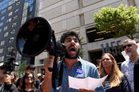 Tareq Samman, a community defense coordinator for Arab Resource and Organizing Center, participates in a strike against Uber’s recent 25 percent wage cut outside Uber's head office in San Francisco, California, U.S., May 8, 2019. REUTERS/Kate Munsch