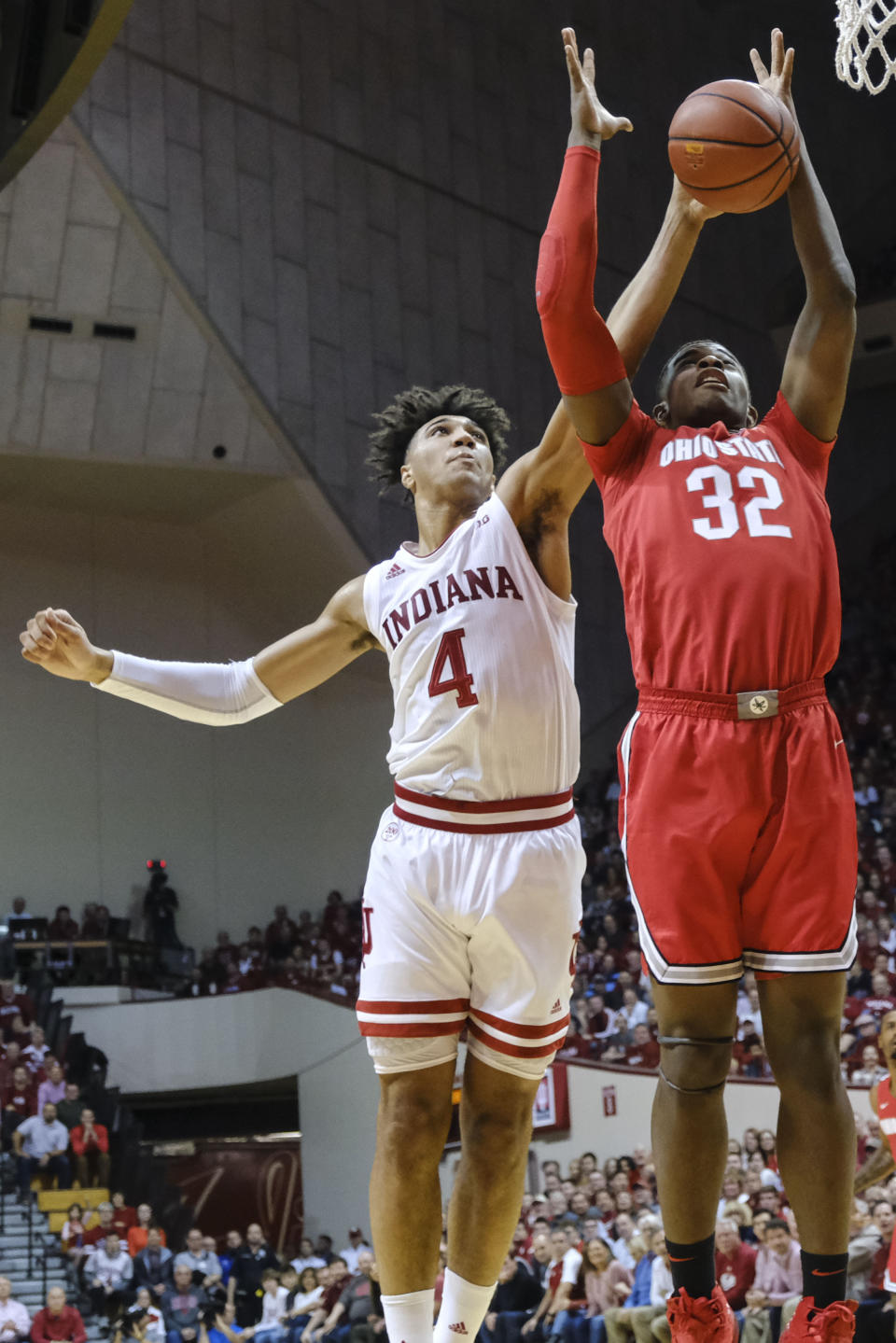 Ohio State forward E.J. Liddell (32) pulls down a rebound in front of Indiana forward Trayce Jackson-Davis (4) in the first half of an NCAA college basketball game in Bloomington, Ind., Saturday, Jan. 11, 2020. (AP Photo/AJ Mast)