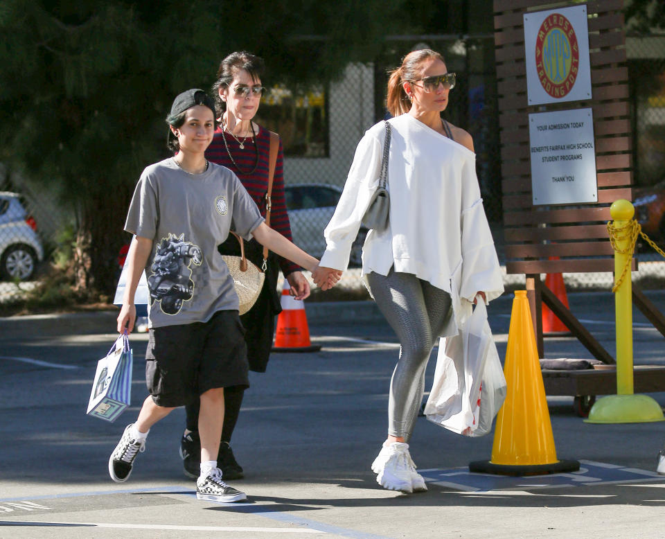 Jennifer Lopez wearing a white sweater, gray leggings and white chunky sneakers, Emma Maribel Muniz and Jennifer Lopez spotted on October 15, 2023 in Los Angeles, California.  (Photo by thecelebrityfinder/Bauer-Griffin/GC Images)