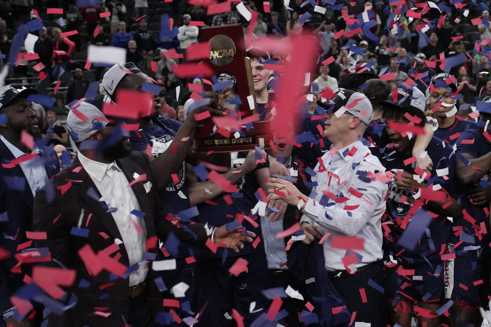 UConn head coach Dan Hurley, right, celebrates after the 82-54 win against Gonzaga of an Elite 8 college basketball game in the West Region final of the NCAA Tournament, Saturday, March 25, 2023, in Las Vegas. (AP Photo/John Locher)