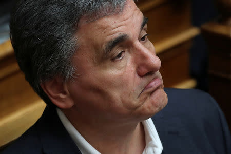 Greek Finance Minister Euclid Tsakalotos looks on during a parliamentary session before a vote on tax breaks in Athens, Greece, May 15, 2019. REUTERS/Alkis Konstantinidis