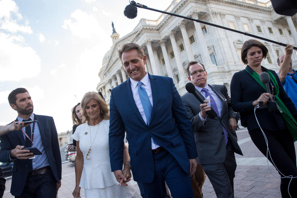 Sen. Jeff Flake (R-Ariz) and his wife Cheryl Flake leave the U.S. Capitol after he announced he will not be seeking reelection. (Photo: Drew Angerer via Getty Images)