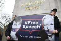 Demonstrators gather outside Australia House to protest against the extradition of Wikileaks founder Julian Assange, in London, Saturday, Feb. 22, 2020. Assange is fighting extradition to the United States on spying charges. (AP Photo/Alberto Pezzali)