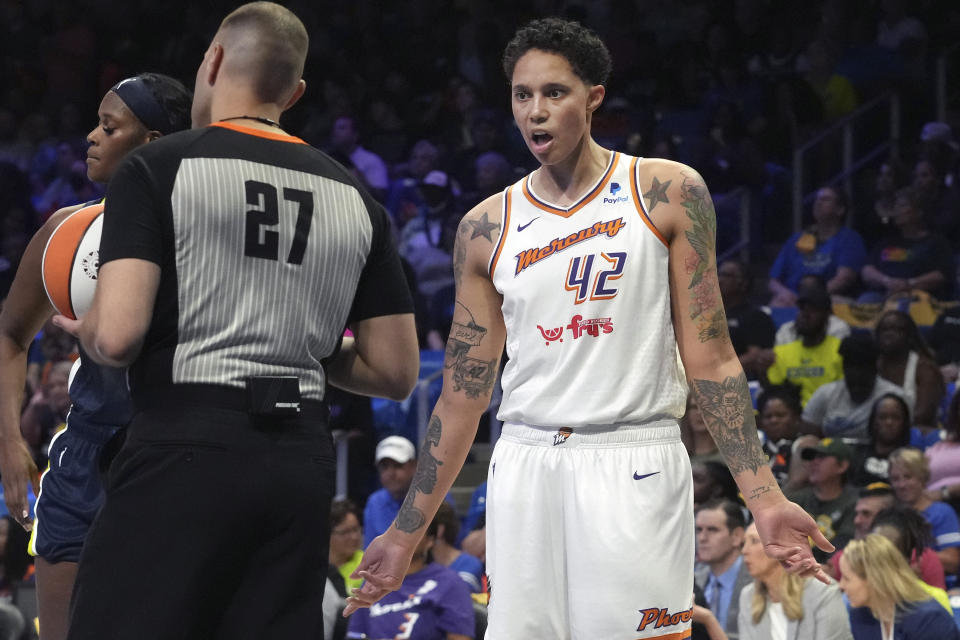Phoenix Mercury center Brittney Griner (42) questions a call during the first half of a WNBA basketball basketball game against the Dallas Wings in Arlington, Texas, Friday, June 9, 2023. (AP Photo/LM Otero)