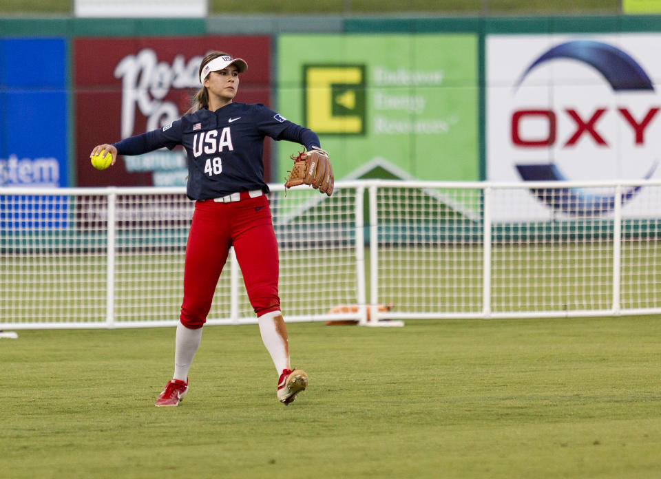 FILE - Team USA's Bubba Nickles (48) throws the ball to the infield after making an out against Team Alliance at Momentum Bank Ballpark in Midland, Texas, in this Saturday, June 13, 2021, file photo. U.S. coach Ken Eriksen predicts tight competition in softball as the sport returns to the Olympics for the first time since 2008. (Jacob Ford/Odessa American via AP, File)