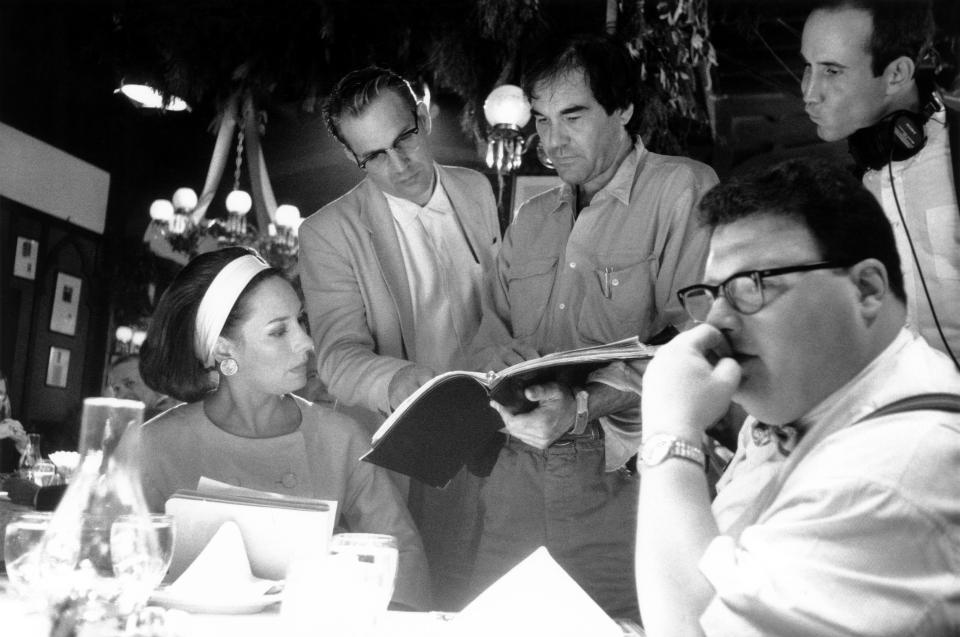 Laurie Metcalf, Kevin Costner, director Oliver Stone, and Wayne Knight on the set of 'JFK.'