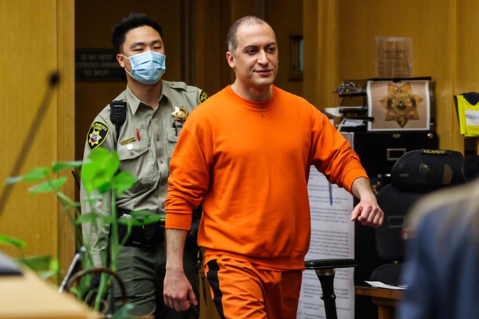 Nima Momeni, the man charged in the fatal stabbing of Cash App founder Bob Lee, makes his way into the courtroom for his arraignment in San Francisco on 2 May (AP)