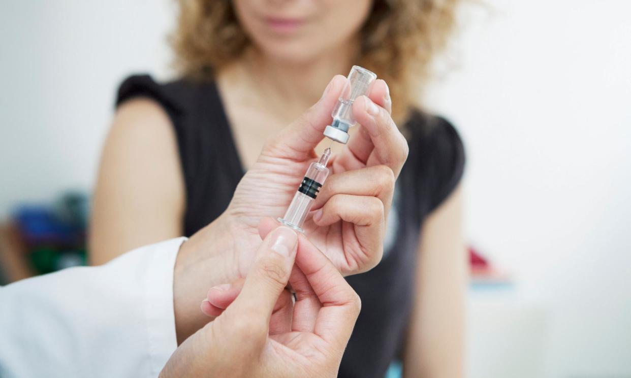 <span>Vaccination rates are lagging among younger and older Australians not up to date on Covid-19 and flu boosters during a winter wave of respiratory viruses, government data shows.</span><span>Photograph: Bsip Sa/Alamy</span>