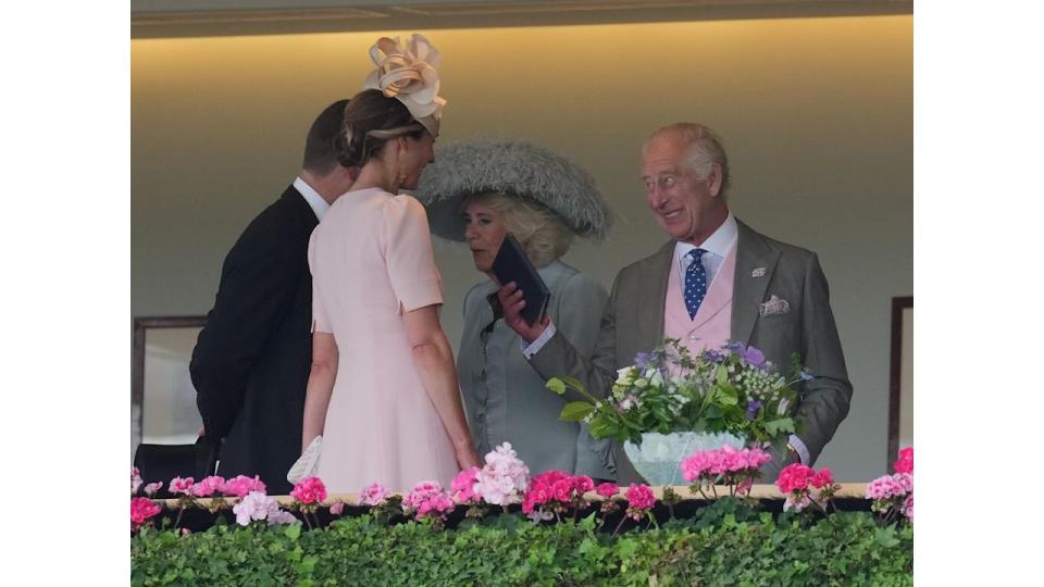 King Charles and Harriet Sperling chatting as Ascot