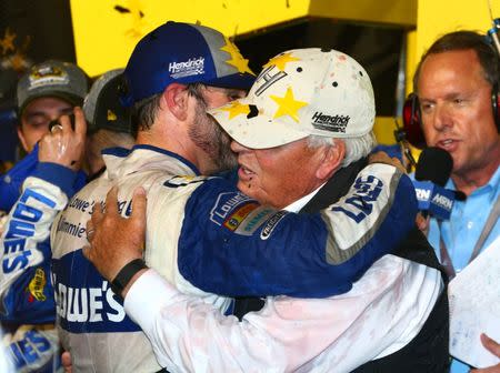 Nov 20, 2016; Homestead, FL, USA; NASCAR Sprint Cup Series driver Jimmie Johnson (left) celebrates with team owner Rick Hendrick after winning the NASCAR Sprint Cup championship and the Ford Ecoboost 400 at Homestead-Miami Speedway. With his seventh championship, Johnson is tied with Richard Petty and the late Dale Earnhardt Sr for championships. Mandatory Credit: Mark J. Rebilas-USA TODAY Sports