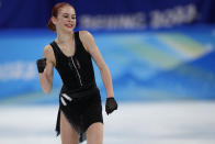 Alexandra Trusova, of the Russian Olympic Committee, reacts after competing in the women's free skate program during the figure skating competition at the 2022 Winter Olympics, Thursday, Feb. 17, 2022, in Beijing. (AP Photo/David J. Phillip)