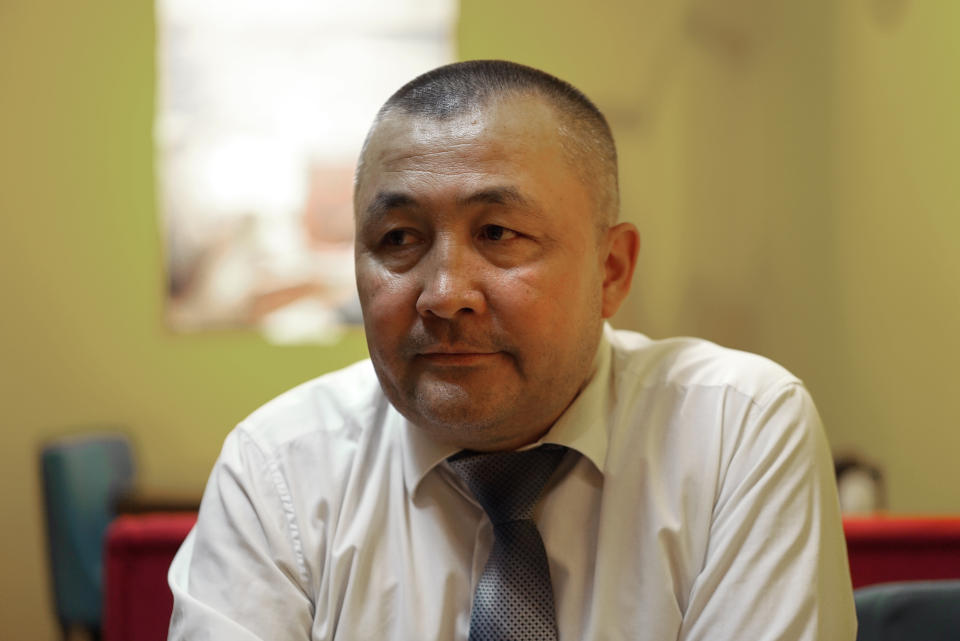 Chinese-born Kazakh activist Bekzat Maxutkanuly poses for a photo in a restaurant in Almaty, Kazakhstan on July 7, 2022. Maxutkanuly says he is signing up people for a planned political party that he hopes will help democratize Kazakhstan and challenge Beijing’s policies in China’s far west Xinjiang region. His activism comes as Chinese leader Xi Jinping visits Central Asia this week, shoring up relations with government across the region. (AP Photo/Dake Kang)