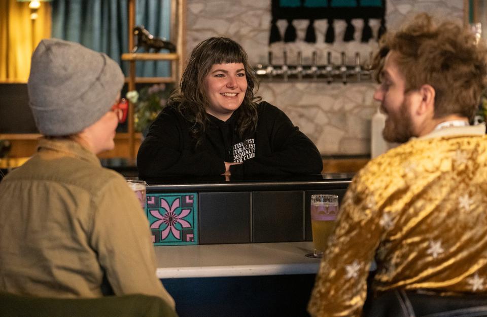 Owner Nicole Oesch talks with customers on Wednesday, Jan. 18, 2023, at Kismetic Beer Company in the Twin Aire neighborhood of Indianapolis. 