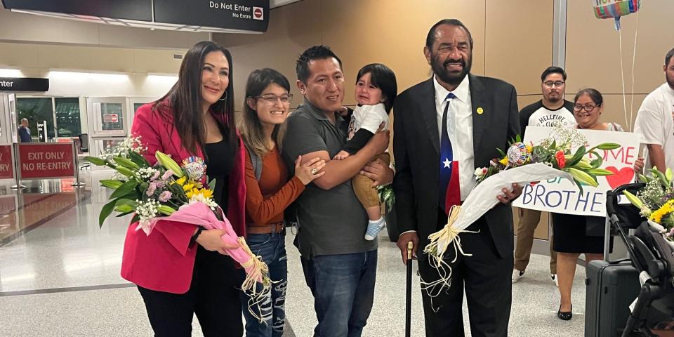 Attorney Naimeh Salem, Yarianna Martinez, Jaime Avalos, Noah, 1, and Rep. Al Green pose for a photo.