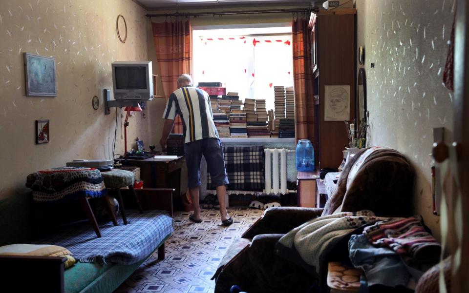  Igor Vitkovskiy, 77, cleans up damage in his home after it was hit by projectiles from a cluster bomb on June 27, 2022 in Sloviansk, Ukraine.  - Photo by Scott Olson/Getty Images