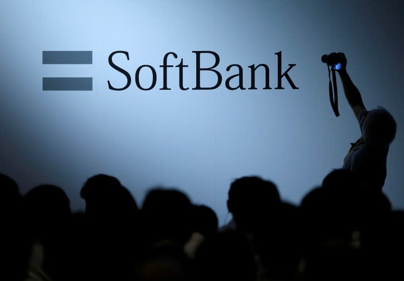 FILE PHOTO: The logo of SoftBank Group Corp is displayed at SoftBank World 2017 conference in Tokyo