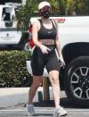 <p>Charli XCX leaves the gym on Tuesday in L.A., wearing a black sports bra and matching biker shorts.</p>