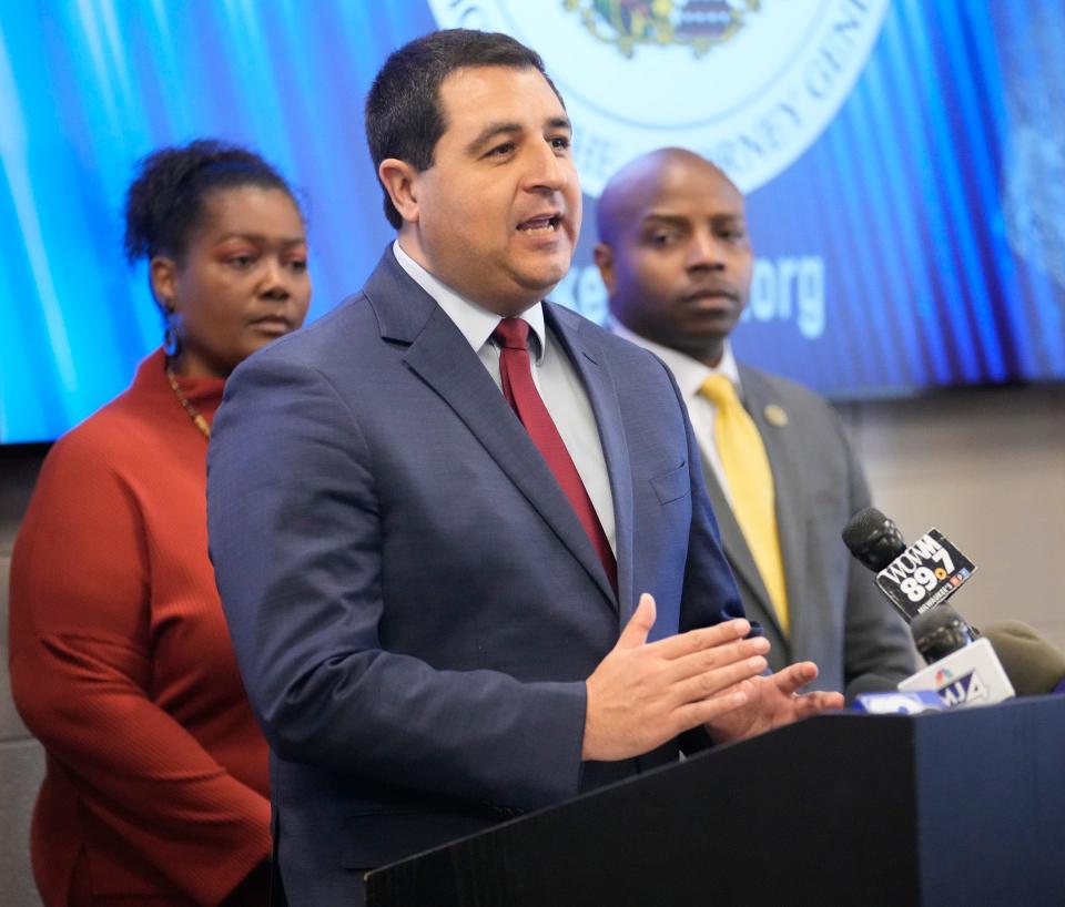 Attorney General Josh Kaul speaks along side Milwaukee resident, Tammy Bartley, who had her 2022 Kia vandalized, and  Milwaukee Mayor Cavalier Johnson, during a press conference calling on Kia and Hyundai help remedy the crisis of car thefts, at Milwaukee Police Administration Building in Milwaukee on Monday, March 20, 2023. Milwaukee leaders, in a coalition of attorneys general, are sending a letter to Kia America (Kia) and Hyundai Motor Company (Hyundai) calling on their leadership to take swift and comprehensive action to help stop the stolen car issues that has occurred as a result of the companies’ failure to equip vehicles with anti-theft immobilizers.