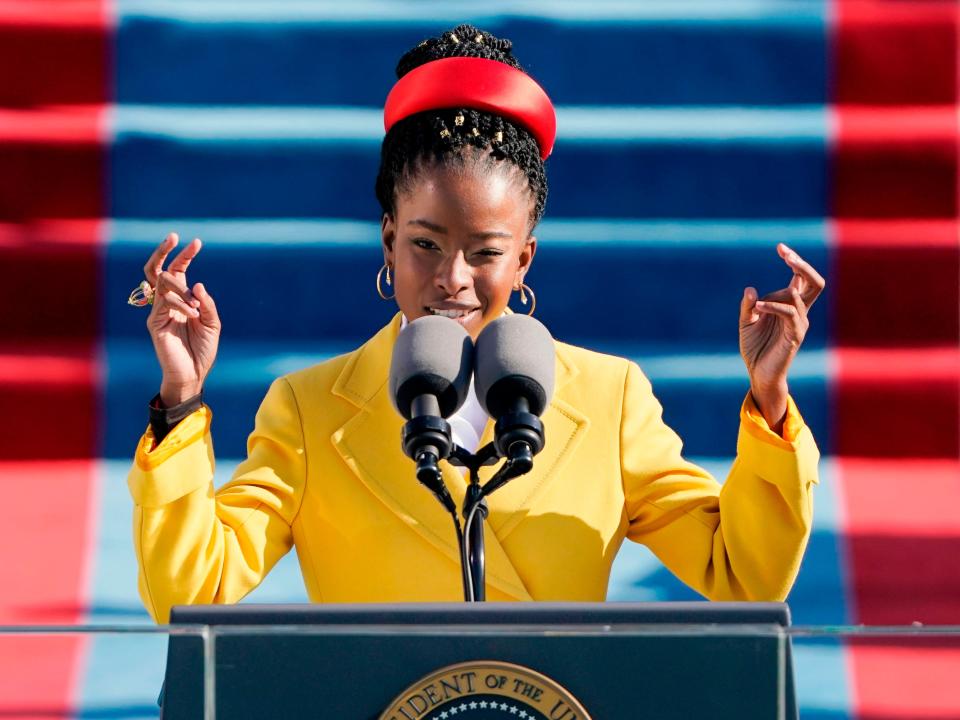 Poet Amanda Gorman reads at Joe Biden’s inauguration on 20 January 2021 in Washington, DC (PATRICK SEMANSKY/POOL/AFP via Getty Images)